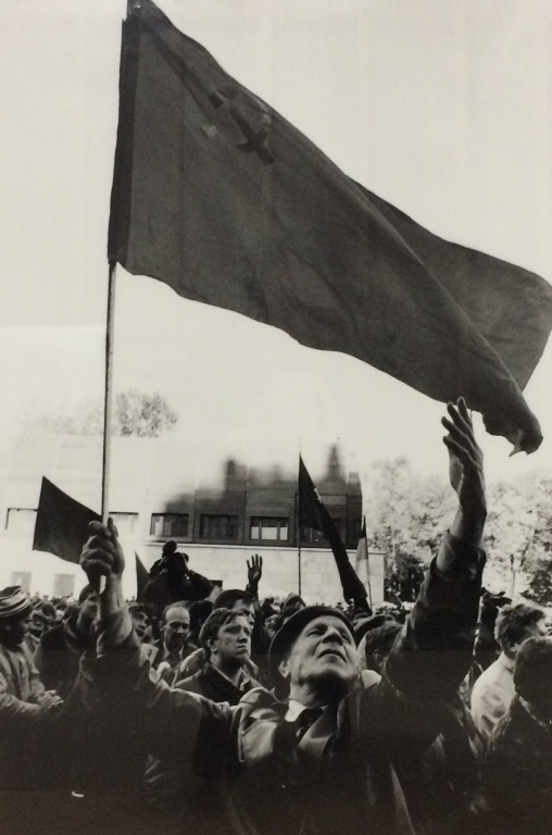 Communist with Soviet flag during the armed conflict between the parliament and President Boris Yeltsin